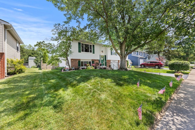 6492 Cherokee Rose Dr, Westerville, OH 43081 - view of front of house with brick siding and a front yard