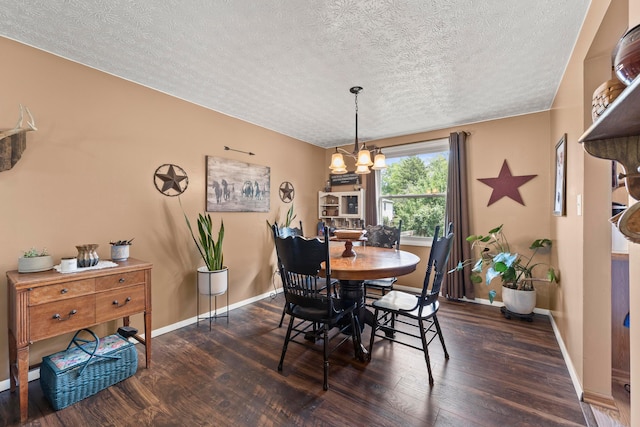 6492 Cherokee Rose Dr, Westerville, OH 43081 - dining room with a chandelier, wood-type flooring, and a textured ceiling