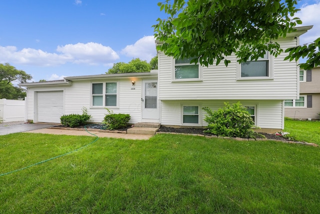 1310 Sweetbay Pl, Galloway, OH 43119 - tri-level home with driveway and a garage