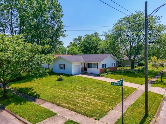 1894 Orlando Rd, Columbus, OH 43232 - single story home with stucco siding, a front lawn, and an attached garage