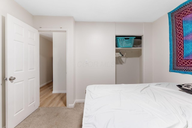 1894 Orlando Rd, Columbus, OH 43232 - bedroom featuring light carpet and a closet