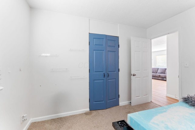 1894 Orlando Rd, Columbus, OH 43232 - bedroom with light carpet and a closet