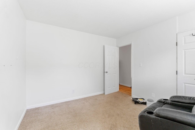 1894 Orlando Rd, Columbus, OH 43232 - living area with light colored carpet and baseboards