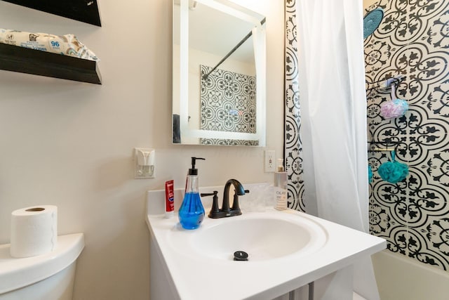 1894 Orlando Rd, Columbus, OH 43232 - bathroom featuring a sink and shower / bath combo