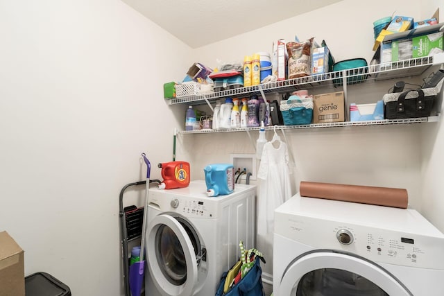 208 Dowler Dr, South Bloomfield, OH 43103 - laundry room featuring separate washer and dryer