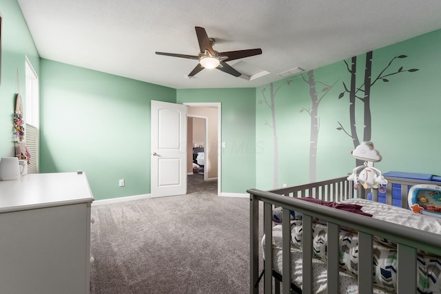 208 Dowler Dr, South Bloomfield, OH 43103 - bedroom featuring carpet flooring, ceiling fan, and a textured ceiling