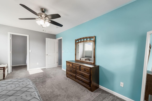 208 Dowler Dr, South Bloomfield, OH 43103 - carpeted bedroom featuring baseboards and ceiling fan