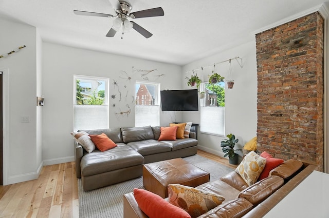 192 E Morrill Ave, Columbus, OH 43207 - living area with light wood-style floors and a ceiling fan