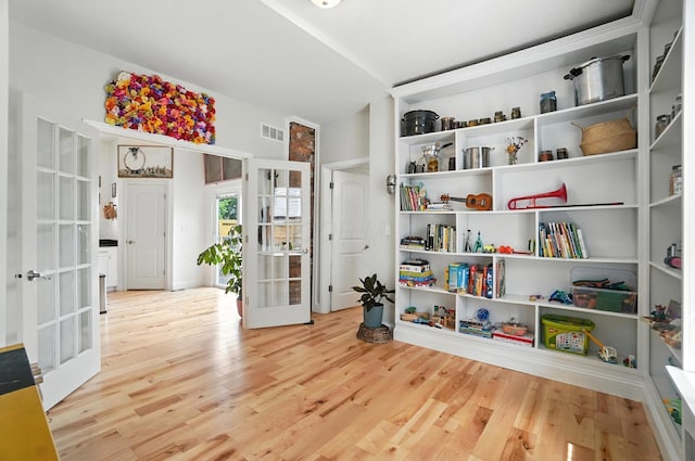 192 E Morrill Ave, Columbus, OH 43207 - sitting room with french doors and light wood finished floors