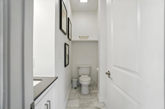 192 E Morrill Ave, Columbus, OH 43207 - bathroom featuring marble look tiles and vanity