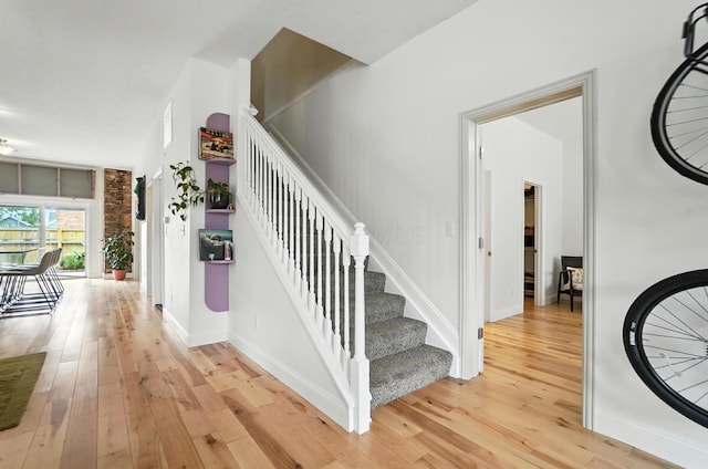 192 E Morrill Ave, Columbus, OH 43207 - stairs featuring wood-type flooring and baseboards