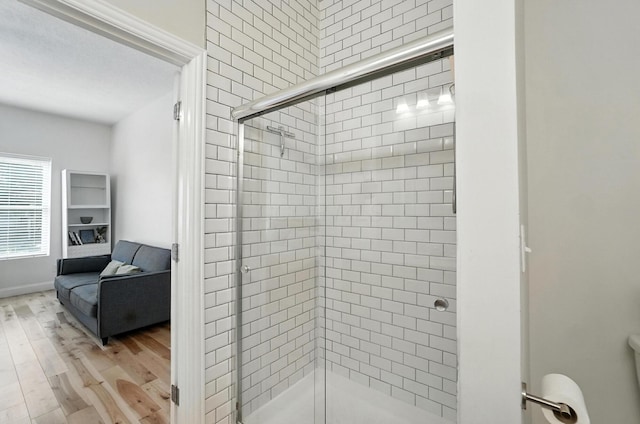 192 E Morrill Ave, Columbus, OH 43207 - ensuite bathroom with a stall shower and wood finished floors