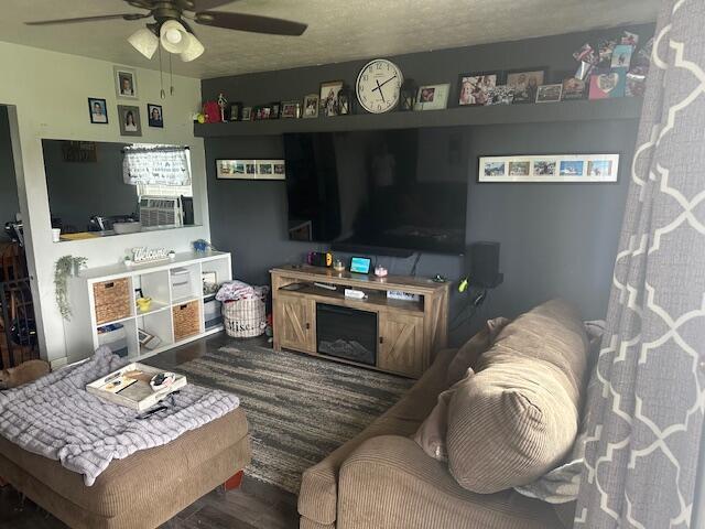 3519 Ontario St, Columbus, OH 43224 - living area with a ceiling fan and wood finished floors