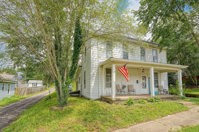 206 W Water St, New Lexington, OH 43764 - view of front of home featuring covered porch