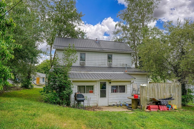 206 W Water St, New Lexington, OH 43764 - back of house with a yard, a metal roof, and cooling unit