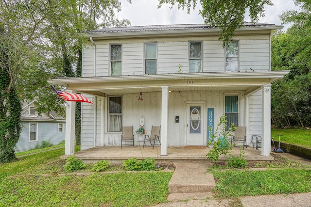 206 W Water St, New Lexington, OH 43764 - view of front of property featuring covered porch