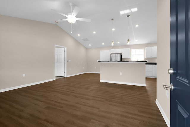 763 Whitetail Loop, Newark, OH 43055 - unfurnished living room with vaulted ceiling, dark wood-style floors, a ceiling fan, and recessed lighting