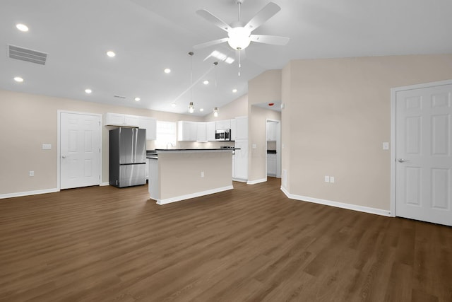 763 Whitetail Loop, Newark, OH 43055 - kitchen with appliances with stainless steel finishes, white cabinets, open floor plan, a ceiling fan, and a kitchen island