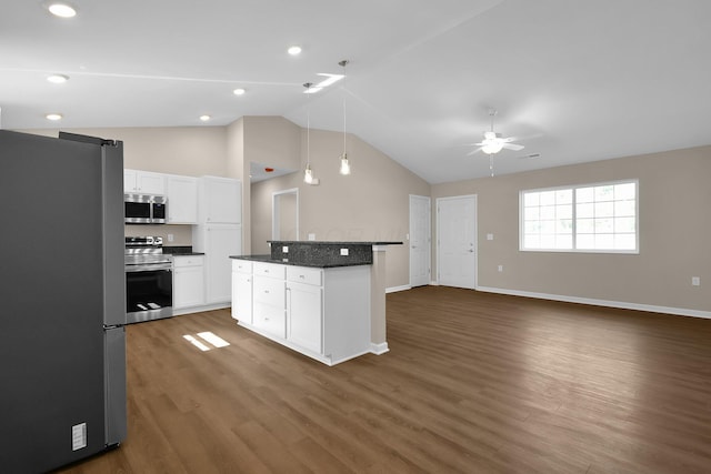 763 Whitetail Loop, Newark, OH 43055 - kitchen featuring stainless steel appliances, dark countertops, ceiling fan, wood finished floors, and white cabinetry