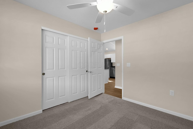 763 Whitetail Loop, Newark, OH 43055 - unfurnished bedroom with carpet flooring, a closet, freestanding refrigerator, and a ceiling fan