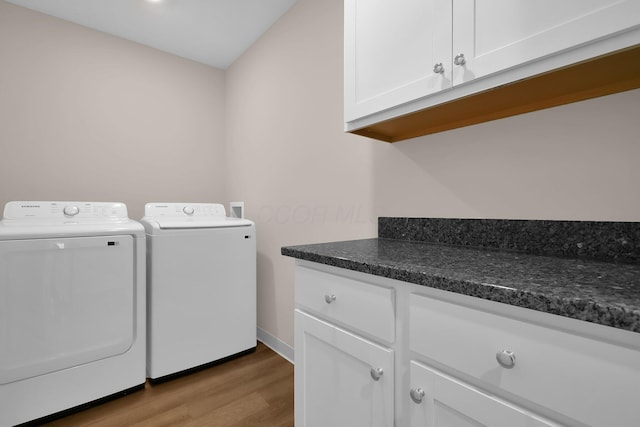 763 Whitetail Loop, Newark, OH 43055 - laundry area with independent washer and dryer, wood finished floors, and cabinet space
