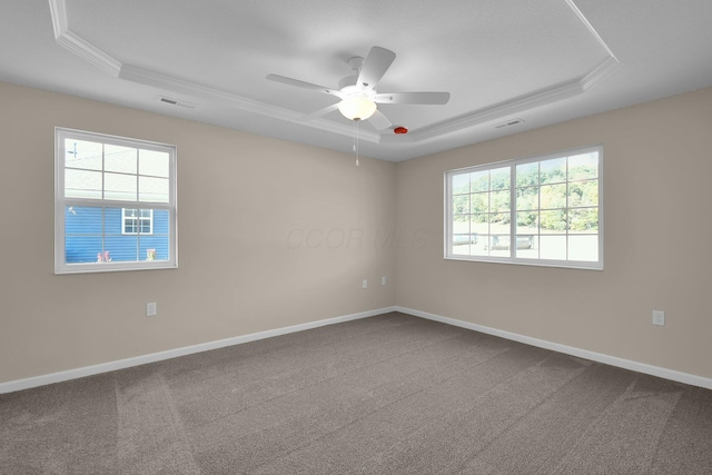 763 Whitetail Loop, Newark, OH 43055 - carpeted empty room with a tray ceiling, crown molding, and a ceiling fan