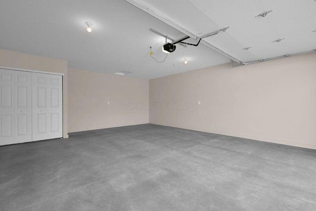 763 Whitetail Loop, Newark, OH 43055 - garage featuring a garage door opener