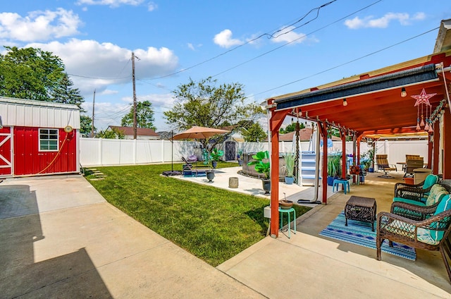 599 S Brinker Ave, Columbus, OH 43204 - fenced backyard with a patio and a storage shed