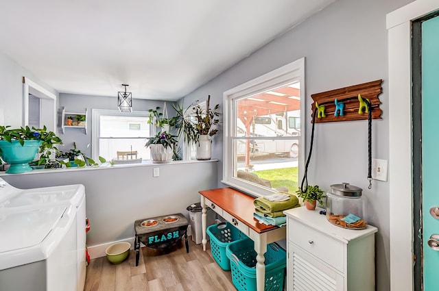 599 S Brinker Ave, Columbus, OH 43204 - washroom featuring light wood finished floors and washing machine and dryer