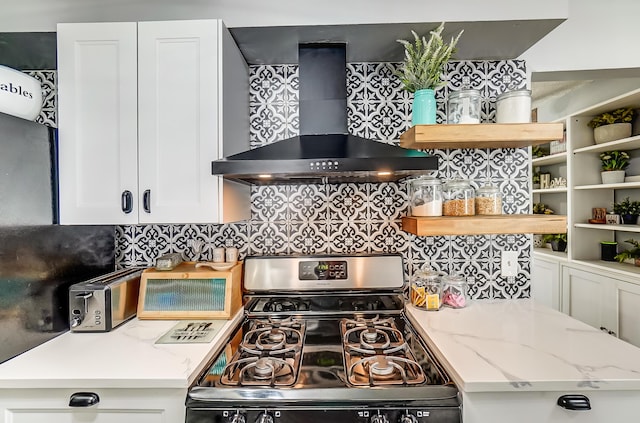 599 S Brinker Ave, Columbus, OH 43204 - kitchen featuring stainless steel gas range oven, wall chimney exhaust hood, backsplash, and open shelves