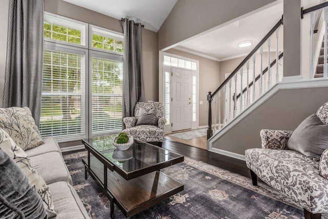 333 Quarter Way, Delaware, OH 43015 - living room featuring stairway, lofted ceiling, crown molding, and wood finished floors