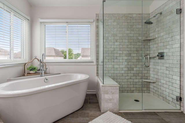 333 Quarter Way, Delaware, OH 43015 - bathroom with a shower stall, a freestanding bath, and tile patterned floors