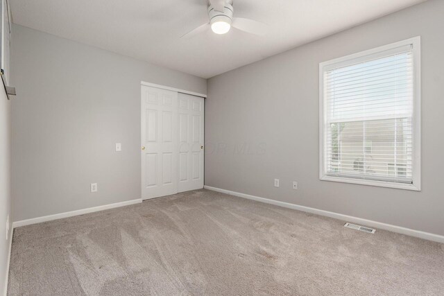 333 Quarter Way, Delaware, OH 43015 - unfurnished bedroom with carpet floors, a closet, and a ceiling fan