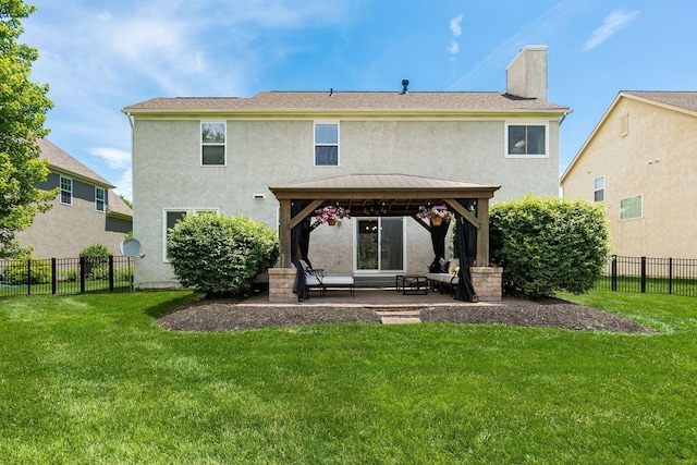 333 Quarter Way, Delaware, OH 43015 - back of house with stucco siding, a gazebo, a chimney, a standing seam roof, and a patio