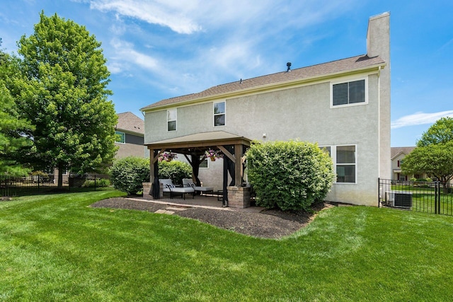 333 Quarter Way, Delaware, OH 43015 - back of house with a gazebo, stucco siding, a chimney, and a patio