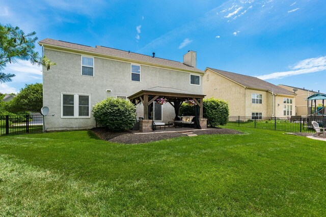 333 Quarter Way, Delaware, OH 43015 - rear view of house featuring a gazebo, stucco siding, a chimney, a fenced backyard, and a patio