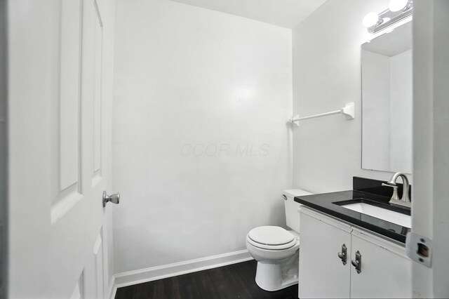 1812 Bennigan Dr Unit 88C, Hilliard, OH 43026 - half bathroom featuring vanity and wood finished floors
