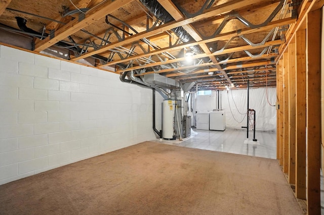 1812 Bennigan Dr Unit 88C, Hilliard, OH 43026 - unfinished basement featuring washing machine and clothes dryer and gas water heater