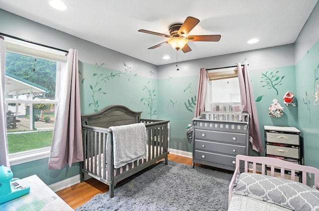 328 Maple Ave, Utica, OH 43080 - bedroom featuring a nursery area, a ceiling fan, wood finished floors, and recessed lighting