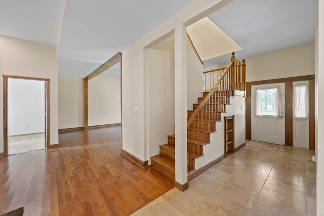5373 Summit Rd SW, Pataskala, OH 43062 - entryway with stairway and light wood finished floors