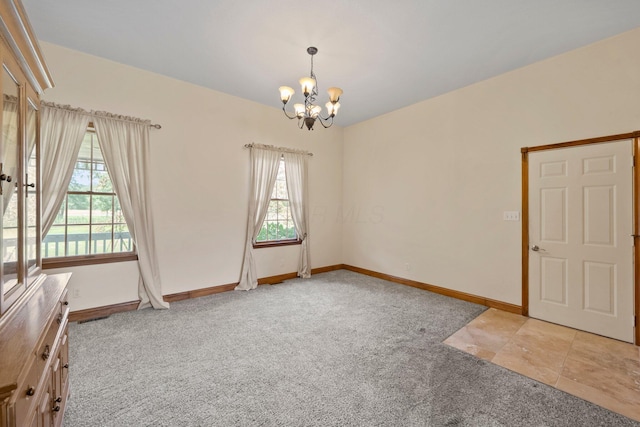 5373 Summit Rd SW, Pataskala, OH 43062 - spare room with light colored carpet, a chandelier, and healthy amount of natural light