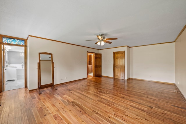 5373 Summit Rd SW, Pataskala, OH 43062 - empty room featuring ceiling fan, light wood-type flooring, and crown molding