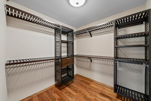 5373 Summit Rd SW, Pataskala, OH 43062 - spacious closet featuring wood finished floors