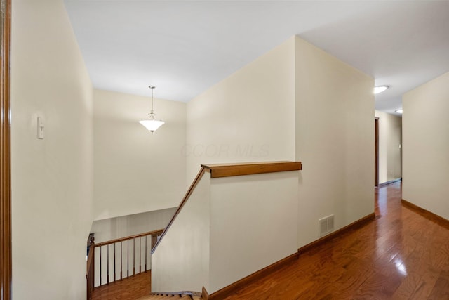 5373 Summit Rd SW, Pataskala, OH 43062 - hallway with an upstairs landing and wood finished floors