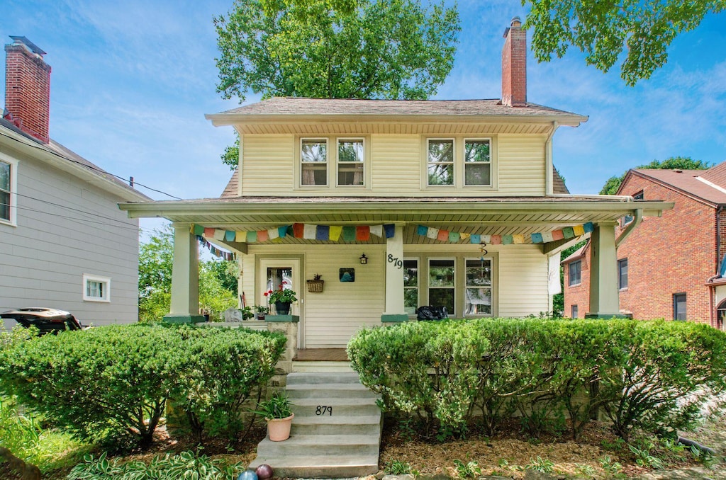 879 College Ave, Columbus, OH 43209 - view of front facade with covered porch and a chimney