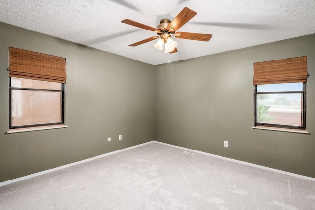 7911 Verandah Ct Unit 58, Powell, OH 43065 - unfurnished room featuring carpet floors, ceiling fan, and a textured ceiling