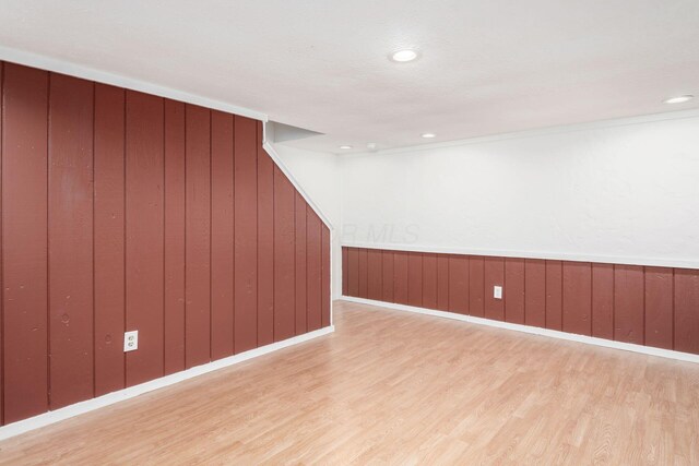 7911 Verandah Ct Unit 58, Powell, OH 43065 - bonus room with light wood-style floors, wood walls, and recessed lighting