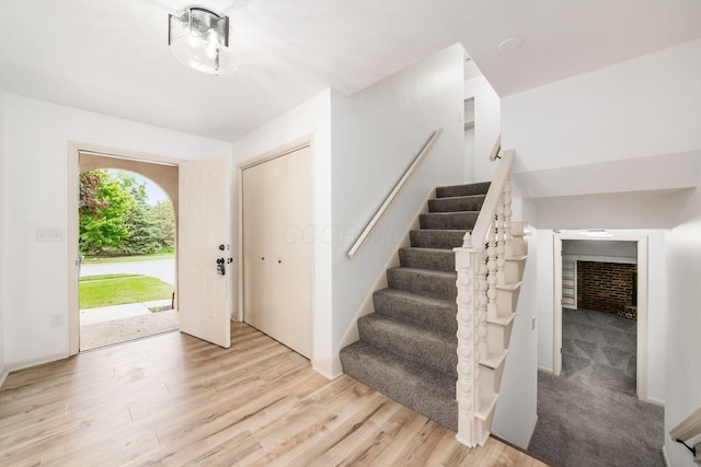 1571 Vinton Ave, Columbus, OH 43220 - entrance foyer with light wood finished floors and stairway