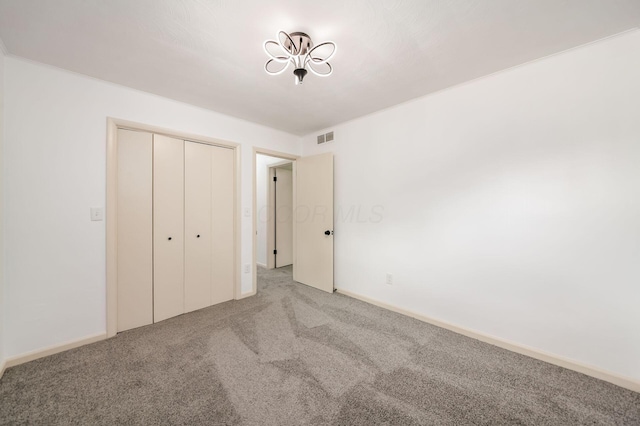 1571 Vinton Ave, Columbus, OH 43220 - unfurnished bedroom with carpet flooring and a closet