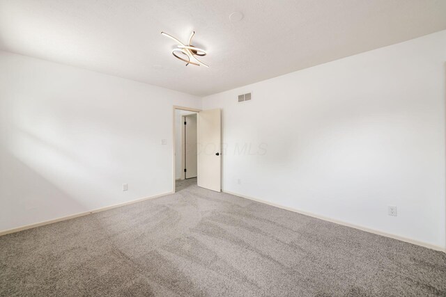 1571 Vinton Ave, Columbus, OH 43220 - carpeted spare room featuring baseboards